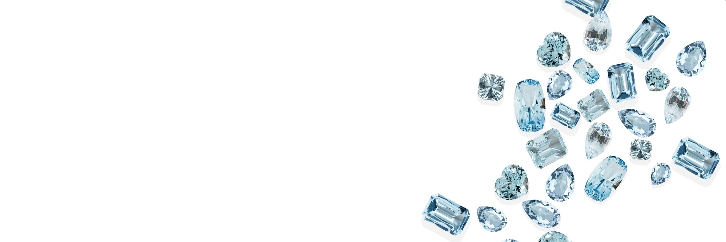 Collection of aquamarine gemstones on a white background