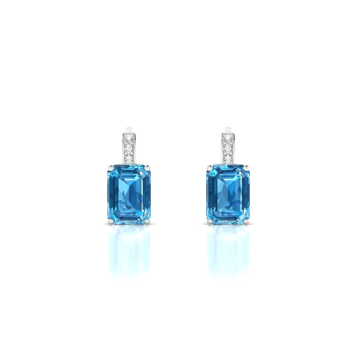 Exquisite | 18k White Gold 7 x 5 mm Emerald Topaz Earrings