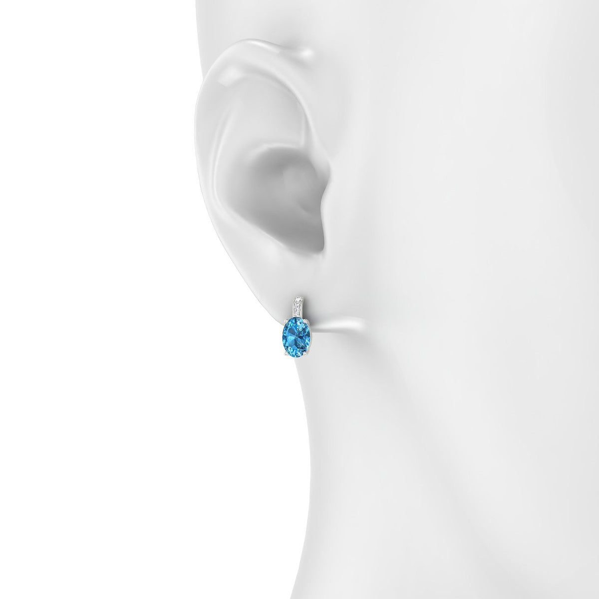 Exquisite | 18k White Gold 7 x 5 mm Oval Topaz Earrings