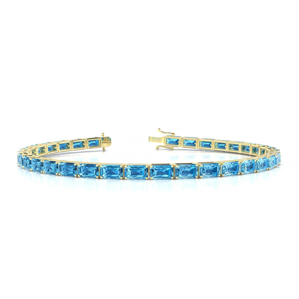 Ozu | 18k Yellow Gold 5 x 3 mm Emerald Natural Topaz Tennis Bracelet