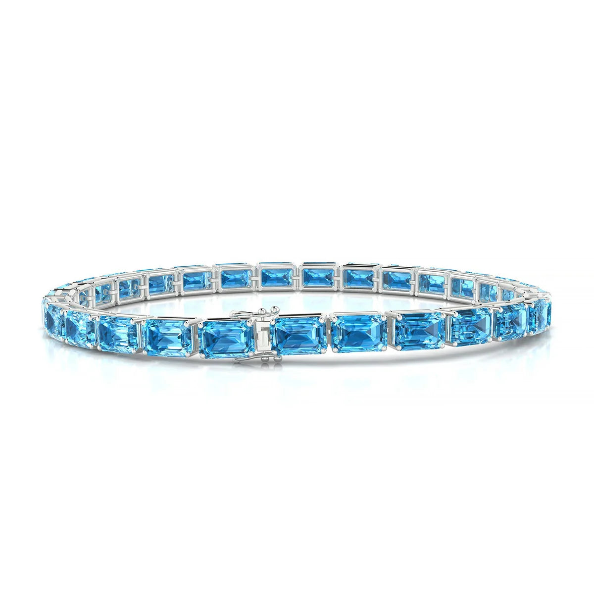 Ozu | 18k White Gold 6 x 4 mm Emerald Natural Topaz Tennis Bracelet