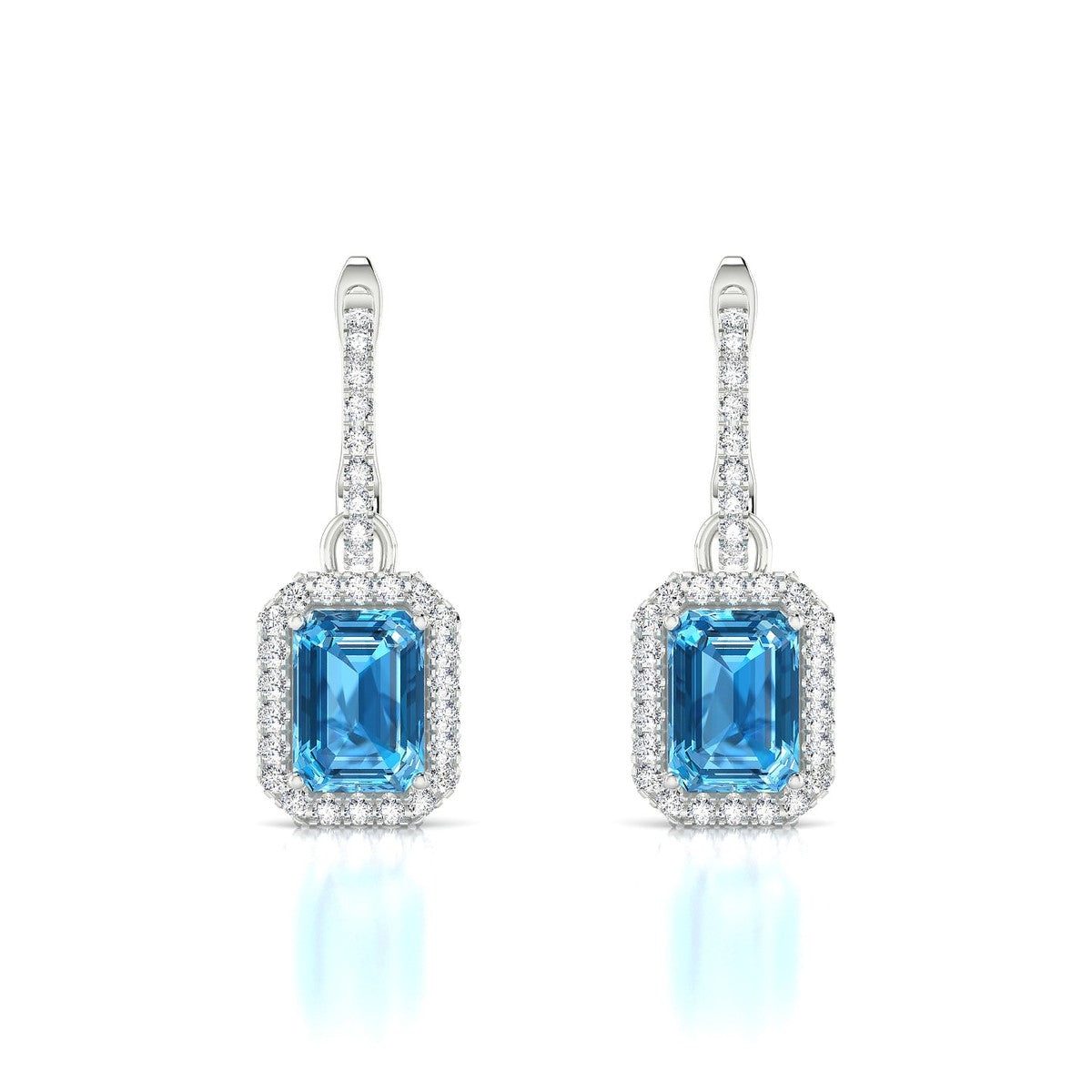 Sunrise | 18k White Gold 7 x 5 mm Emerald Topaz Earrings