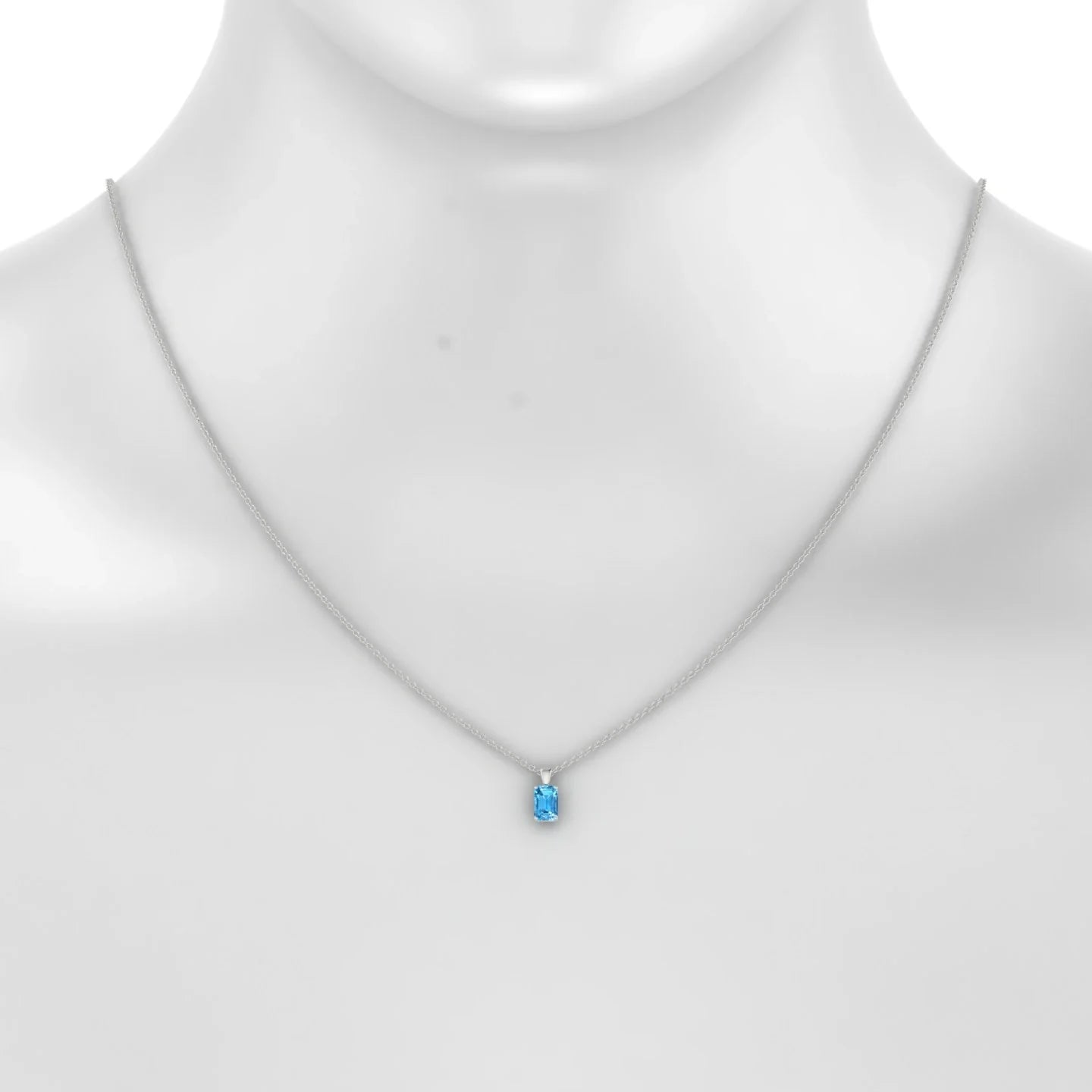 Reverse | 18k White Gold 6 x 4 mm Emerald Topaz Pendant